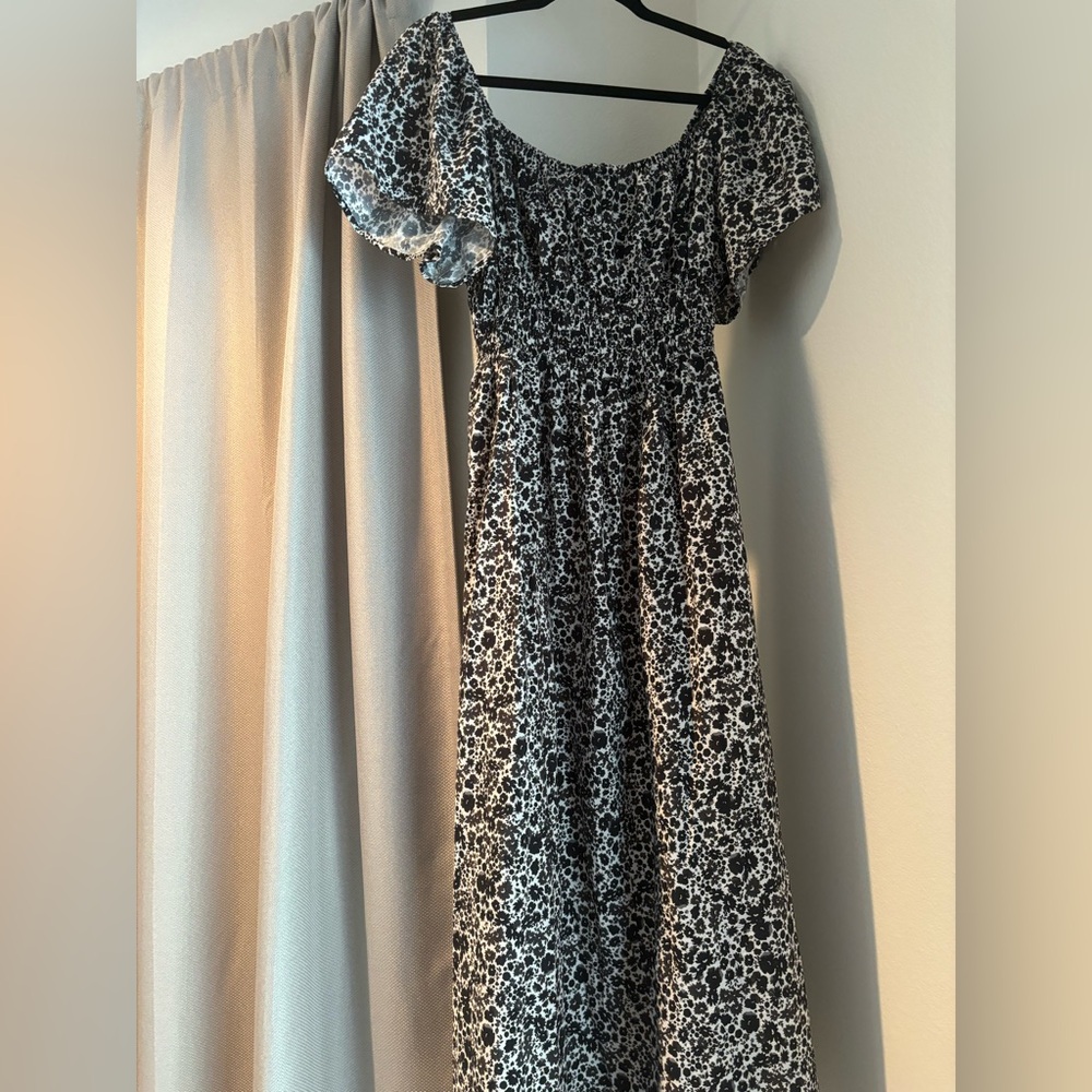 H&M black and cream puffed sleeve midi dress.